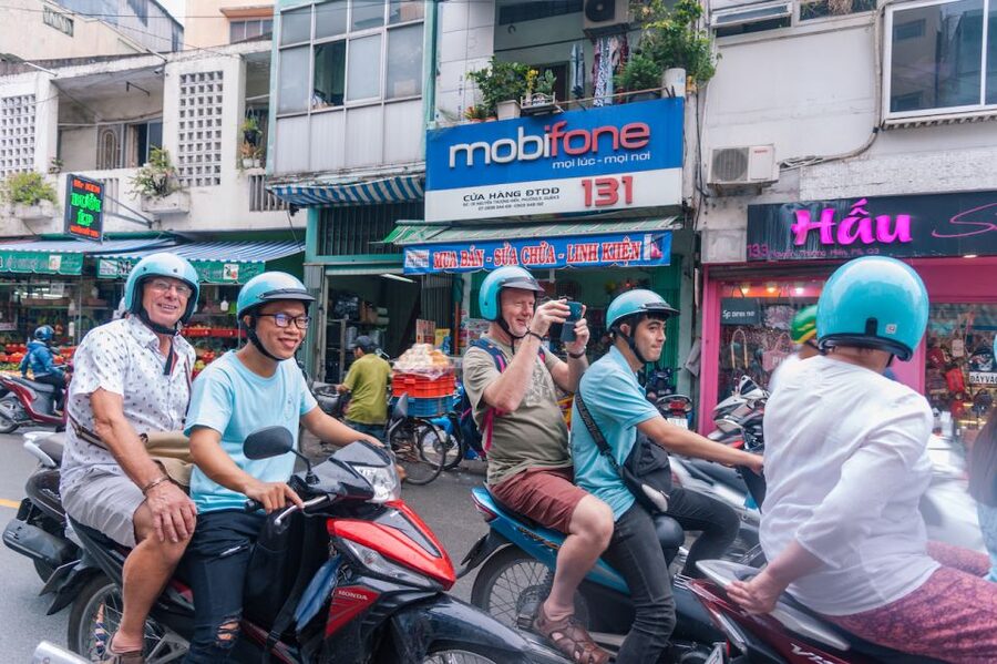 Saigon: City Highlights and Saigon Unseen Scooter Combo Tour - Narrow lanes and old apartment blocks