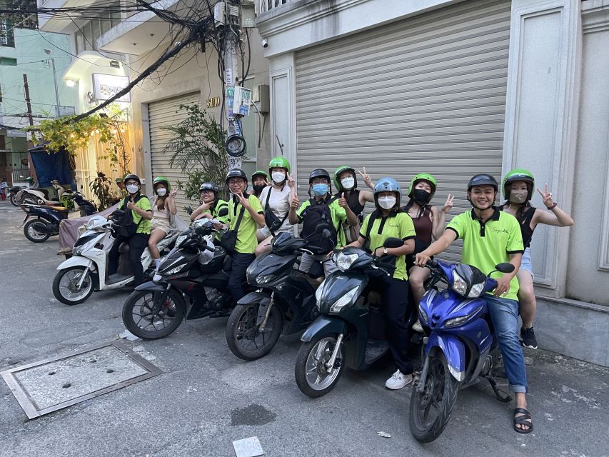 Saigon: Night Craft Beer And Street Food Tour By Vespa - Rooftop beer above the evening traffic