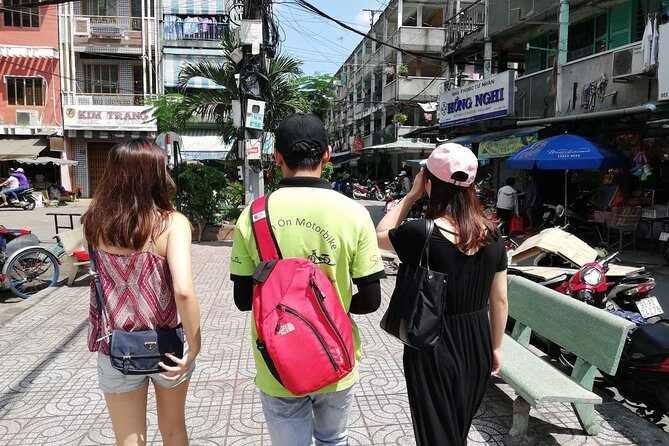 Saigon Night Scooter Experience And Local Food - Flower market, fashion streets, and bridges