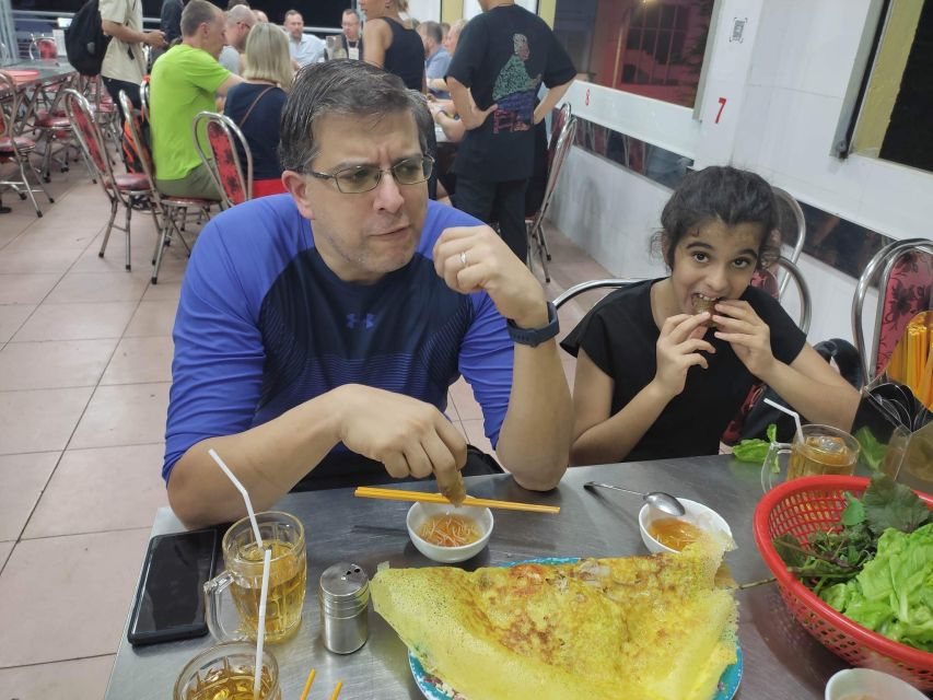 Saigon: Night Sightseeing And Street Food Tour By Vespa - District 4 and the famous Vietnamese bread