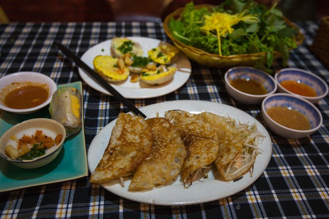 Saigon Night Street Food and City Tour on Scooter - Vietnamese pancakes make the first food stop