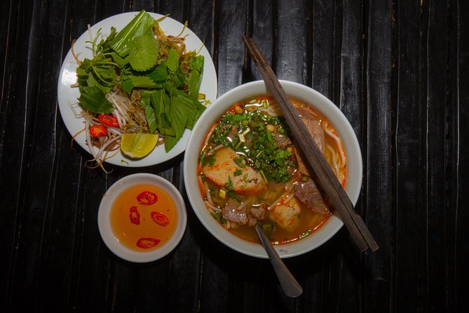 Saigon Night Street Food and City Tour on Scooter - Vietnamese barbecue is the evening’s big event