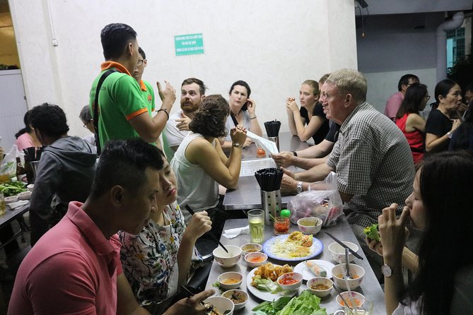 Saigon Vespa By Night Street Food Tour 4,5 Hours - Two local restaurants and a full evening meal