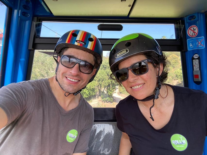 Santiago sunset tour on an electric scooter. City and nature - La Sagrada Familia and the Lo Contador campus