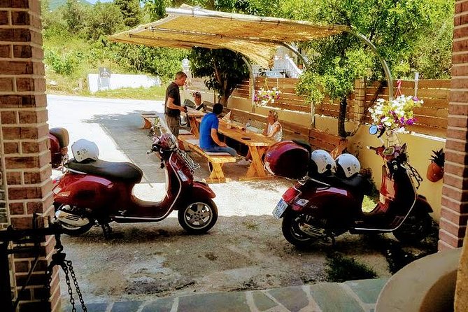Savour The Flavors Of Corfu Vespa Scooter Tour - The Governor’s olive mill explains Corfu’s liquid gold