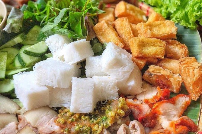 Scooter tour and street food around Buon Ma Thuot city. - 6:00 p.m. pickup and the first ride through town