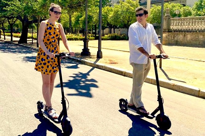 Scooter tour in Seville - Torre del Oro and the riverfront opening