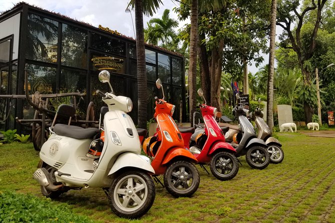 Siem Reap Food Tour by Vespa - Stop one: Sombai rice liqueurs and unusual souvenirs