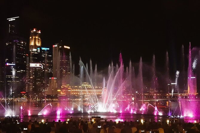Singapore: Sunset Kick Scooter Tour - War memory, Raffles Hotel, and Bugis after dark