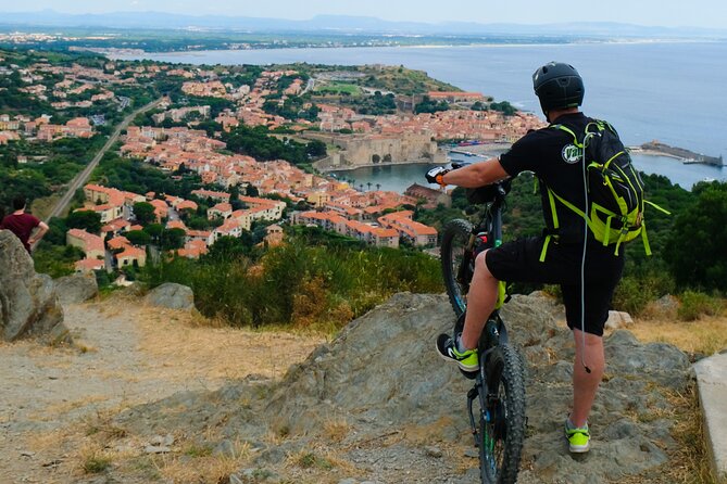 The Collioure Tops on Electric Scooters - Collioure’s bay, bell tower, and lighthouse