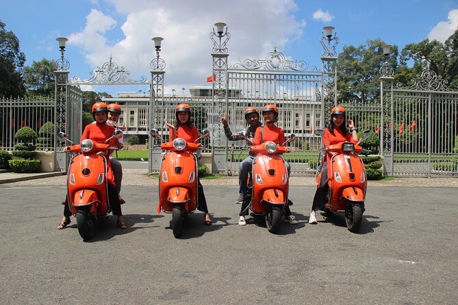 The Insider's Saigon With Female Ao Dai Riders Vespa 4,5 Hours - Cholon, Binh Tay Market, and Thien Hau Pagoda