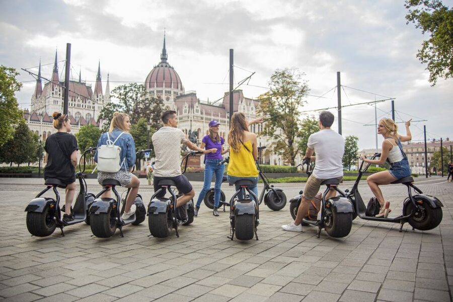 Top sights of Pest downtown on e-scooters incl. Parliament - Ten minutes to learn the scooter
