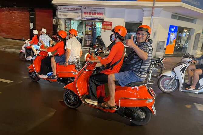 Vespa Female Ao Dai riders Night Street Food + See Train Street - The small-group format and the guide experience