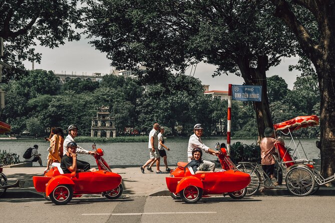 Vespa Sidecar Sightseeing and Cuisine Tour in Hanoi - Markets, train tracks, and Hanoi’s changing streets