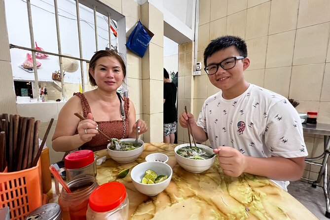 Vespa Tour HANOI BACK STREETS: FOOD+LOCAL LIFE+CULTURE & FUN - Lunch near Hanoi Train Station